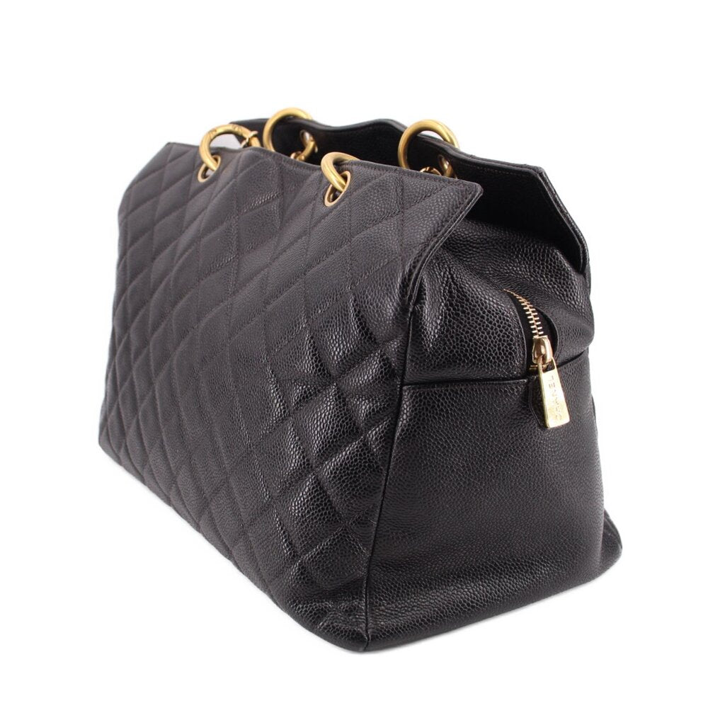 CHANEL grand shopper tote bag side view with front zipper pocket and gold hardware