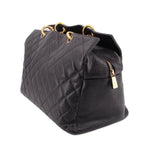 CHANEL grand shopper tote bag side view with front zipper pocket and gold hardware