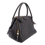 Black Louis Vuitton Marais MM handle bag with textured monogram and gold-tone zipper pull.