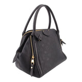 Black Louis Vuitton Marais MM handle bag with textured monogram and gold-tone zipper pull.
