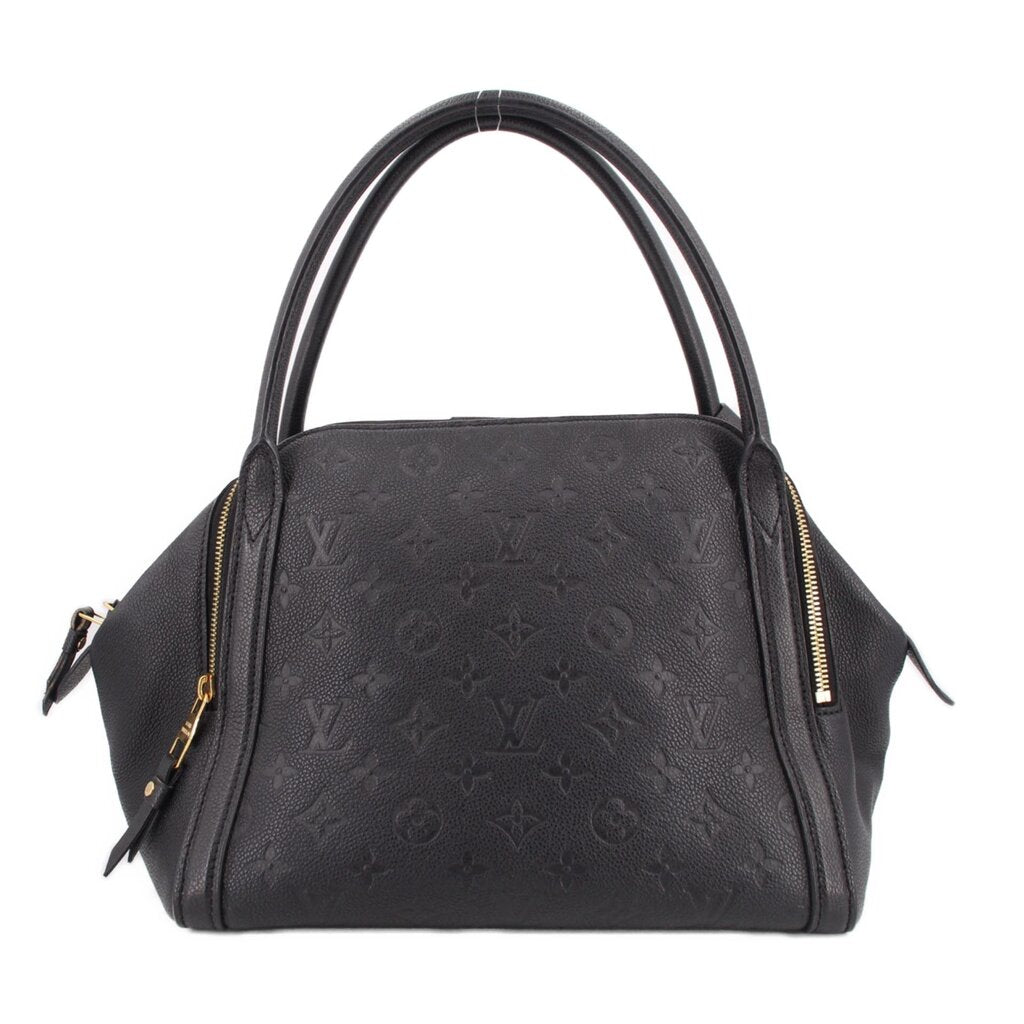 Black handle bag with embossed monogram pattern and structured top with two handles.