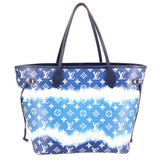 Blue tie-dye Neverfull tote with repeating Louis Vuitton logos and dark leather corner tabs