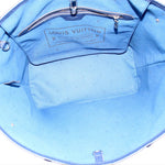 Inside view of Louis Vuitton Neverfull tote with fabric lining and brand label