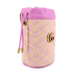 Pink mini bucket bag crossbody with GG logo jacquard and gold hardware, angled side view.