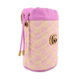 Pink mini bucket bag crossbody with GG logo jacquard and gold hardware, angled side view.