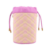 Pink mini bucket crossbody with GG monogram allover print and drawstring-style cords.
