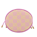 Pink mini bucket crossbody showing top-oval opening with GG monogram pattern and trim.