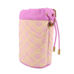 Pink mini bucket crossbody with GG monogram, gold-toned hardware, and pink cord pulls.