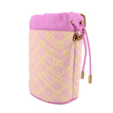Pink mini bucket crossbody with GG monogram, gold-toned hardware, and pink cord pulls.