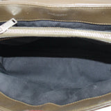 Olive puffer bag interior with zipper opening and fabric lining