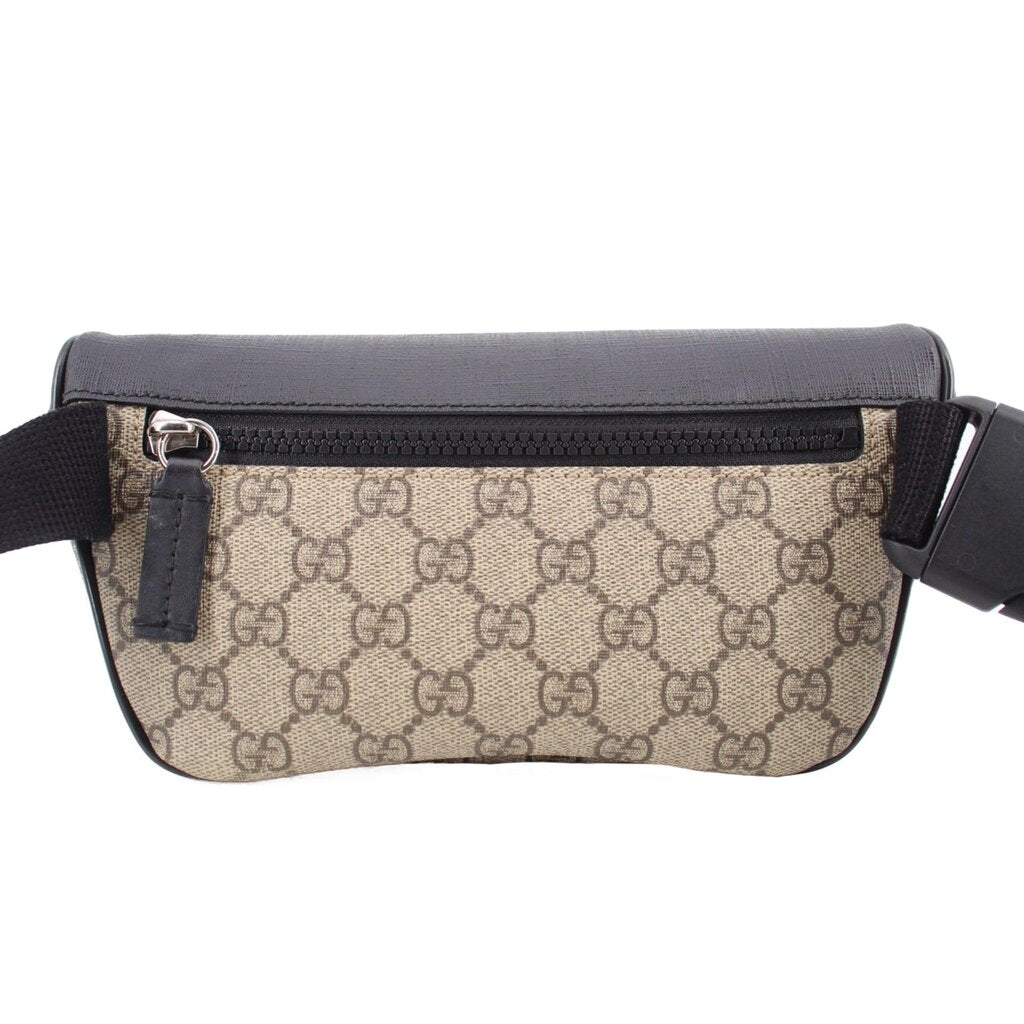 GUCCI small belt bag, tan GG canvas with black trim and front zip, crossbody strap