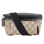 GUCCI small belt bag in tan and black GG canvas with top zip and wide web strap