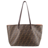 Medium tote front view in Tobacco Zucca FF monogram canvas with leather handles.