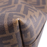 Tobacco Zucca FF monogram canvas corner with brown leather trim close-up.