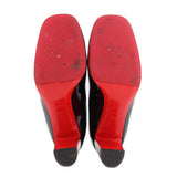 LOUBOUTIN black patent pump soles with red outsole details