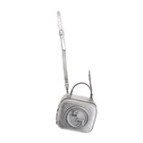 GUCCI Blondie mini top-handle crossbody bag, silver with embossed GG logo and short strap.