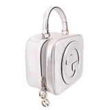 Gucci silver mini top-handle crossbody bag, side view with interlocking G detail