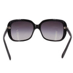 Black sunglasses with dark lenses, gold-tone hinges, and slim curved arms.