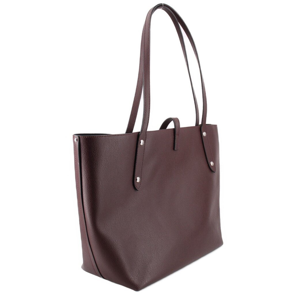 Coach market tote bag in burgundy leather with structured sides and top handles