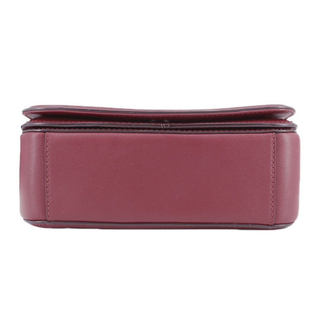 Maroon crossbody bag base with stitched panel seams and layered construction