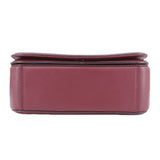 Maroon crossbody bag base with stitched panel seams and layered construction
