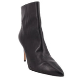 Black ankle bootie with pointed toe and stiletto heel