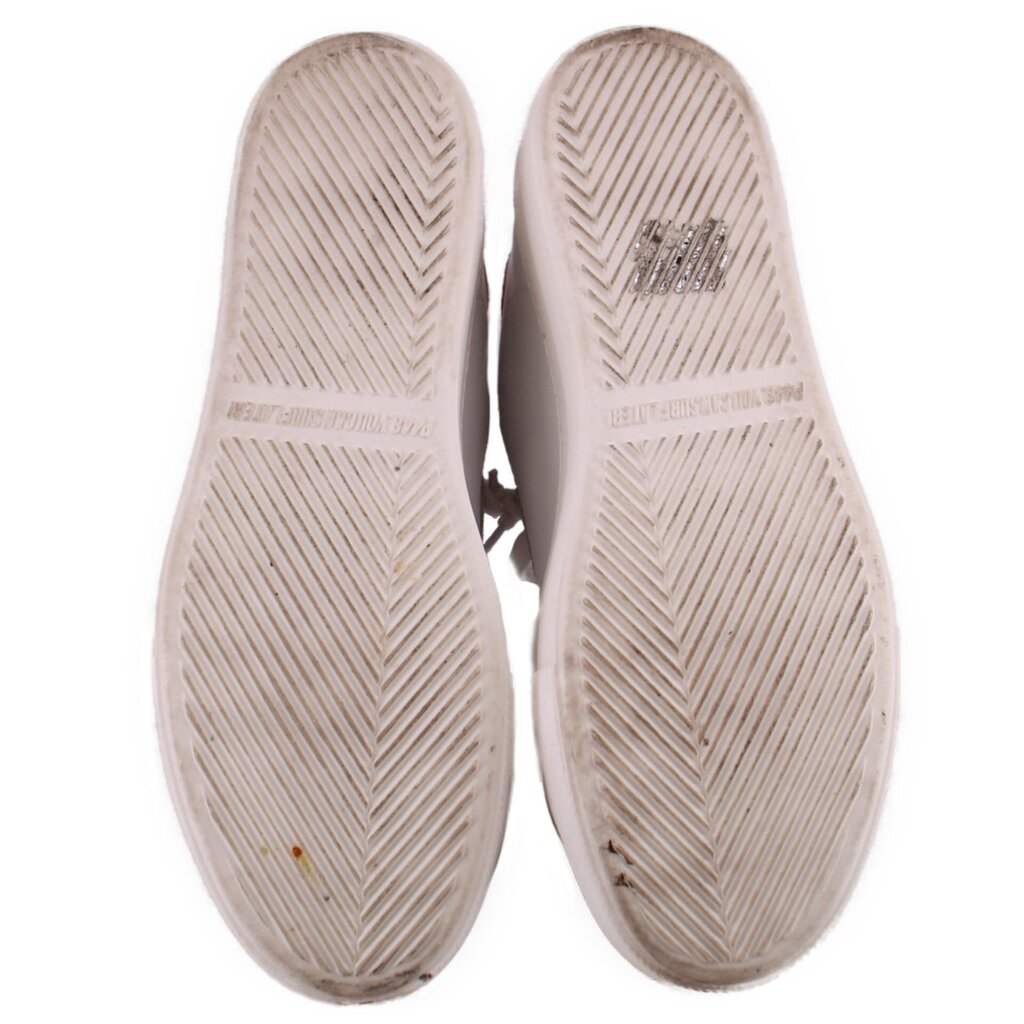 White platform sneaker outsoles with herringbone rubber tread pattern