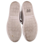 White platform sneaker outsoles with herringbone rubber tread pattern