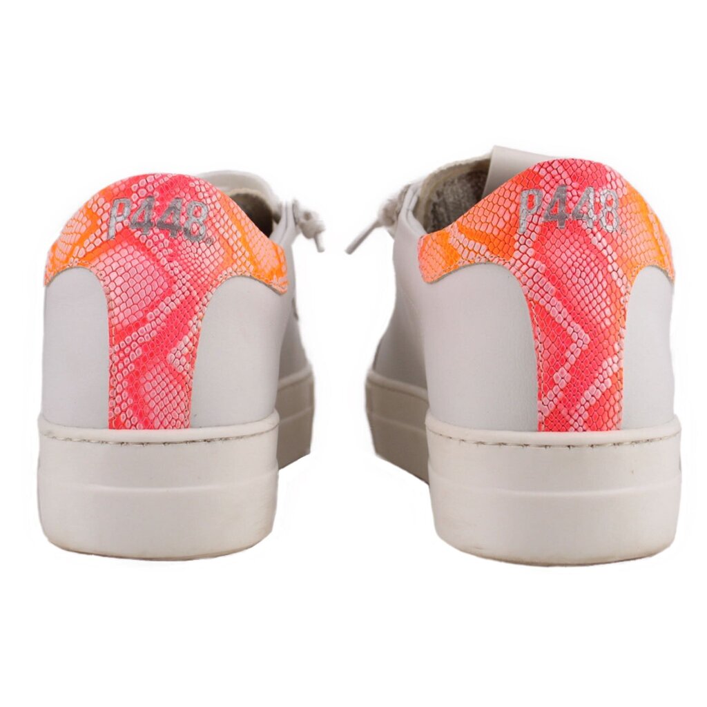 Back of white leather platform sneakers with orange heel panels and P448 branding