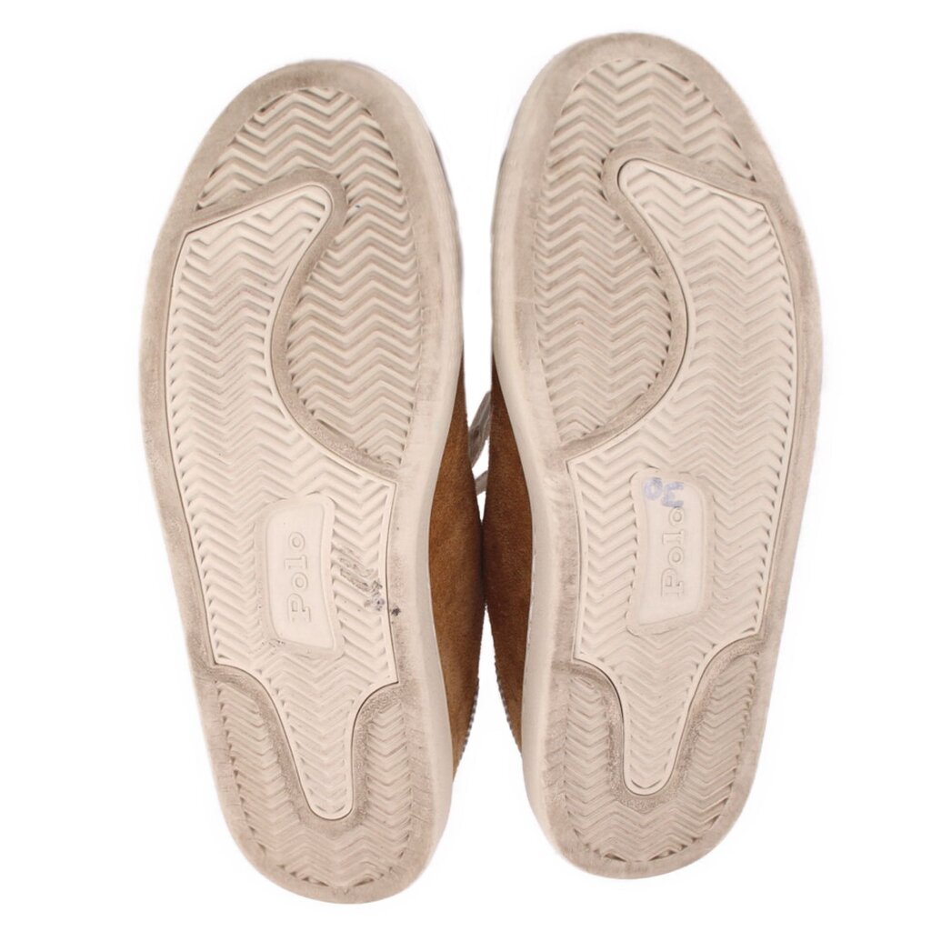 Light outsoles with zigzag tread and small 'Polo' marking.