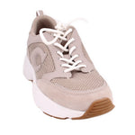 Gray knit low-top sneakers with white laces and white sole, brown tread outsole