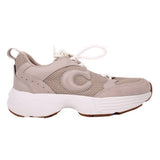 Gray low-top sneakers with mesh panels, suede overlays, white laces, white midsole
