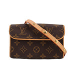 Monogram canvas belt bag with tan leather flap and gold-tone hardware