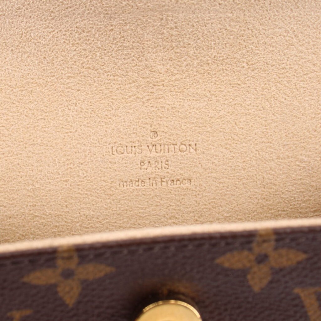 Louis Vuitton Paris made in France stamp on beige leather lining