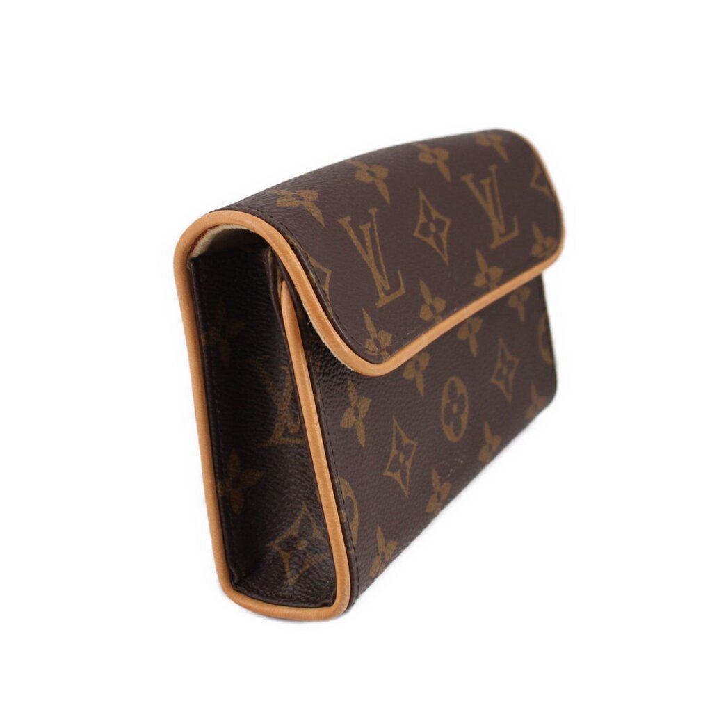 Monogram belt bag with curved flap and tan leather trim, interior visible
