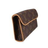 Monogram belt bag with curved flap and tan leather trim, interior visible