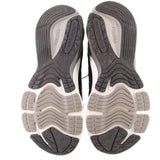 Pair of New Balance sneakers with sculpted rubber outsoles and deep tread