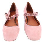 Pink suede Mary Jane flats with jeweled strap, round toe, and low sole