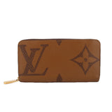 Monogram zip wallet in brown with LV pattern and gold zipper hardware
