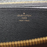 Black interior panel with Louis Vuitton Paris logo text and monogram texture