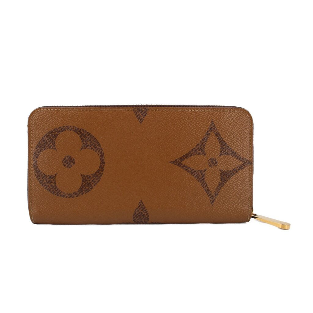 Brown monogram zip wallet with LV and flower diamond motifs, gold zipper pull