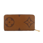 Brown monogram zip wallet with LV and flower diamond motifs, gold zipper pull