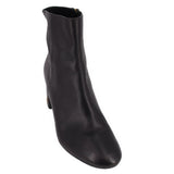Black leather ankle boot with short shaft and round toe.