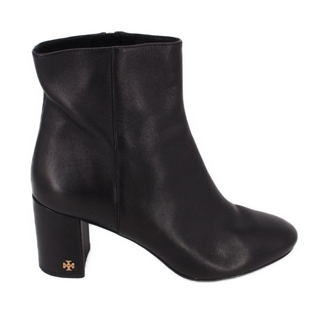 Black leather ankle boot with block heel and side seam details.