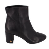Black leather ankle boot with block heel and side seam details.