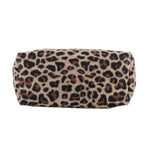 Bottom of the leopard-print tote showing its wide rectangular base