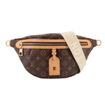LOUIS VUITTON monogram belt bag with front zipper, tan trim, canvas strap.