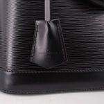 Black interior leather pocket tag with LOUIS VUITTON Paris branding.