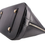Black leather corner with top zipper track and metal pull hardware detail.