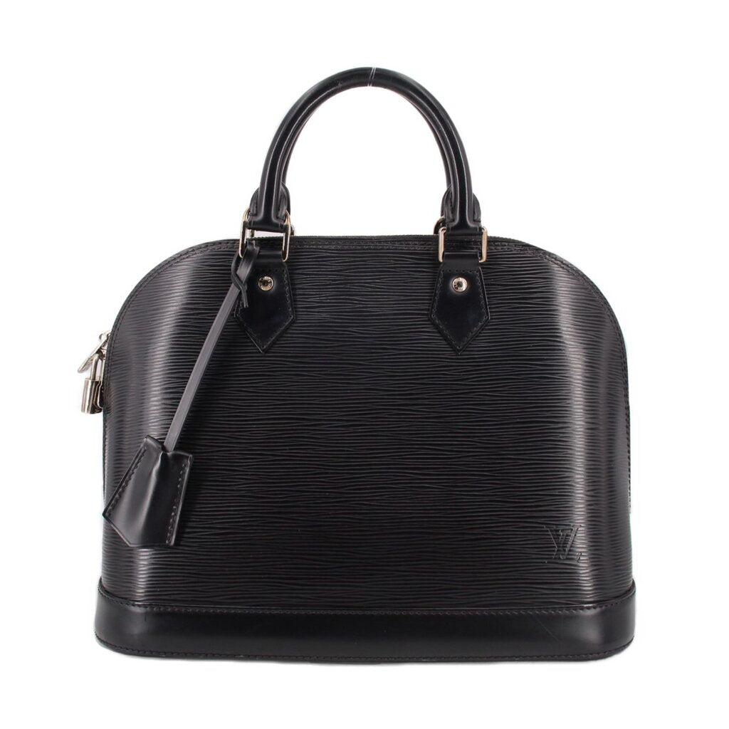 Black structured leather dome top-handle bag with front straps and top zipper hardware.